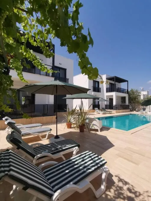 Image 3 of Brand New 2 Bedroom Garden Floor Flat with Pool A1