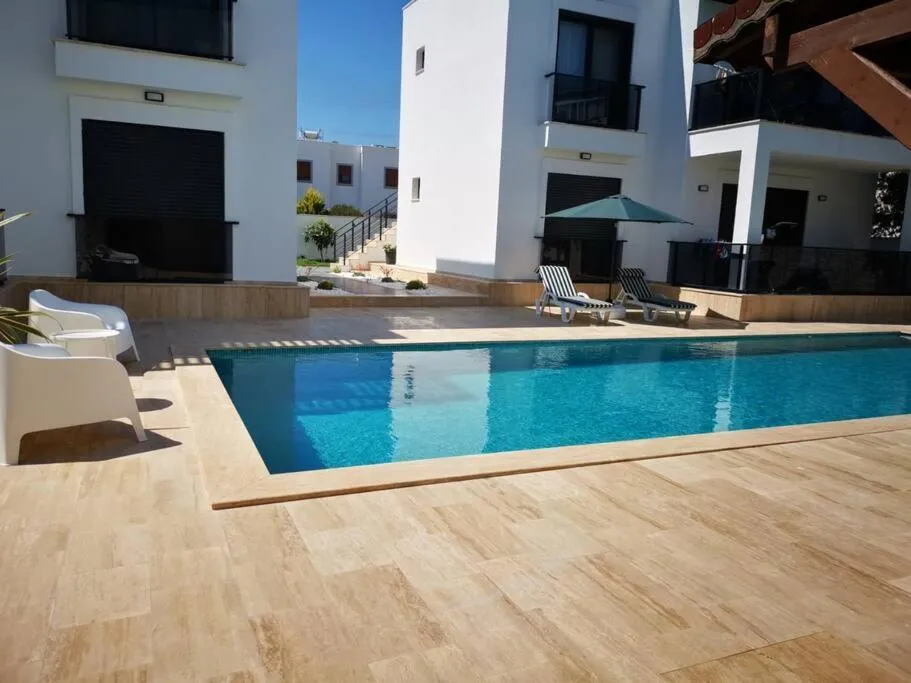 Image 1 of Brand New 2 Bedroom Garden Floor Flat with Pool A1