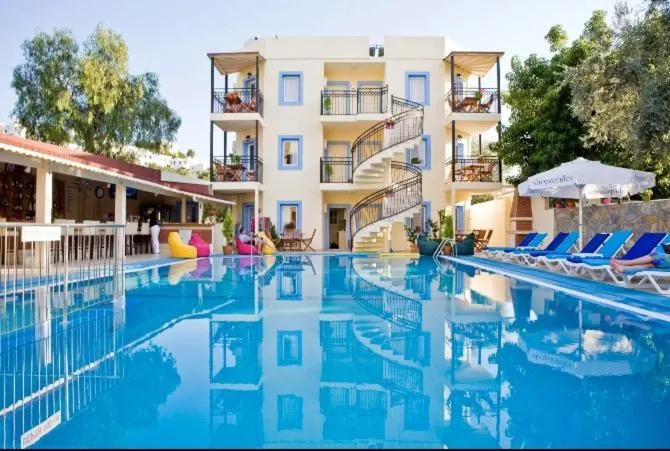 Image 2 of Merve Apartments, your home from home in central BODRUM, street cats frequent the property, not all apartments have balconies , ground floor have terrace with table and chairs
